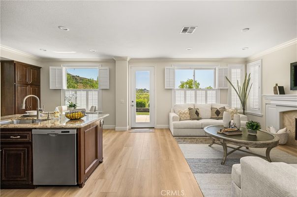 Fireplace, Interior, Kitchen, Living room, Recessed Lighting, Wood Texture Flooring