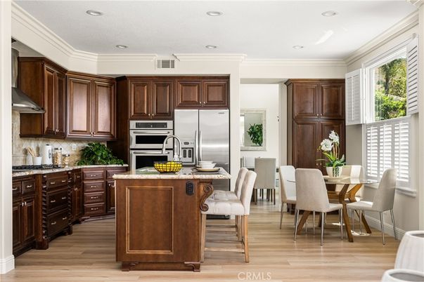 Dining room, Interior, Kitchen, Recessed Lighting, Stainless Steel Appliances, Wood Texture Flooring