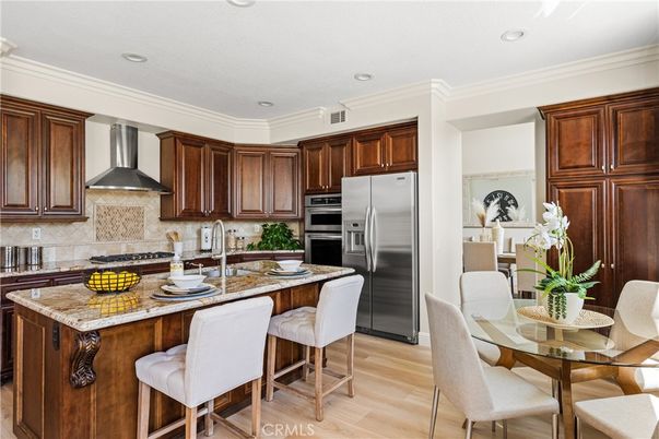 Dining room, Interior, Kitchen, Recessed Lighting, Stainless Steel Appliances, Wood Texture Flooring