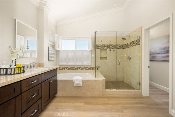 Bathroom, Dual Sink Vanities, Glass Shower, Interior, Recessed Lighting, Wood Texture Flooring
