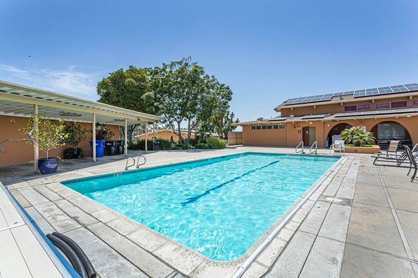Exterior, Pool, Solar Panels