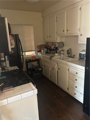 Interior, Kitchen, Tile Countertops, Wood Texture Flooring