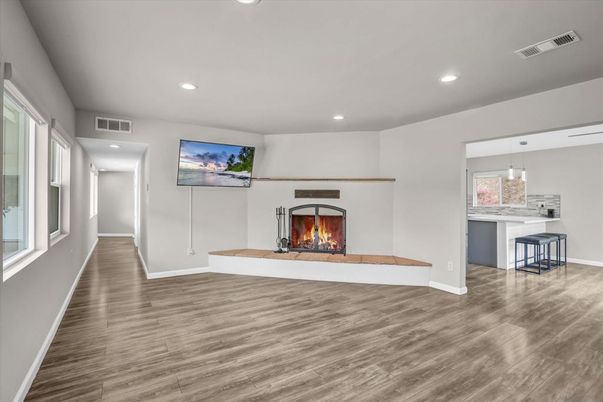 Fireplace, Interior, Pendant Lights, Recessed Lighting, Wood Texture Flooring