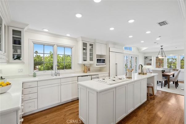 Dining room, Interior, Kitchen, Pendant Lights, Recessed Lighting, Stainless Steel Appliances, Wood Texture Flooring