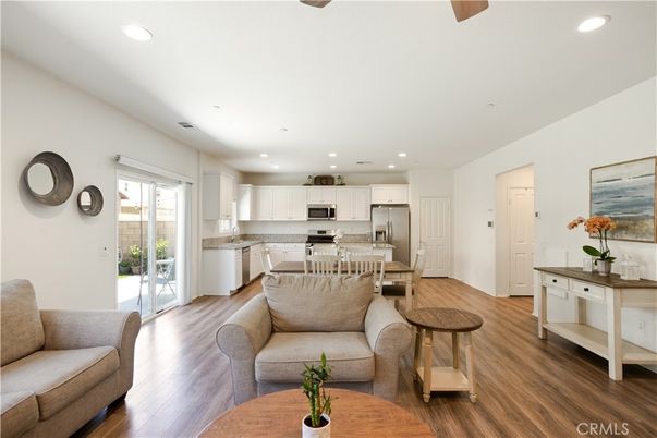 Dining room, Interior, Kitchen, Living room, Recessed Lighting, Stainless Steel Appliances, Wood Texture Flooring