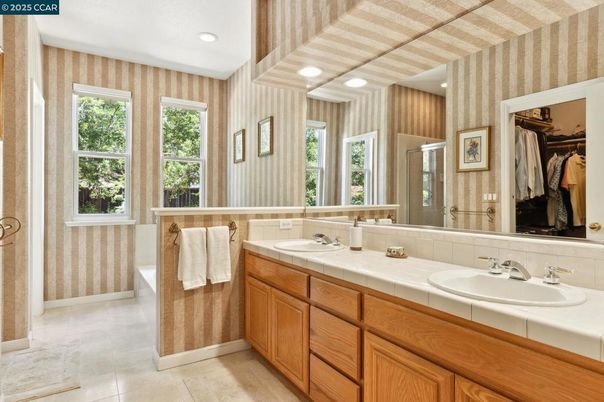 Bathroom, Dual Sink Vanities, Interior, Recessed Lighting, Tile Countertops