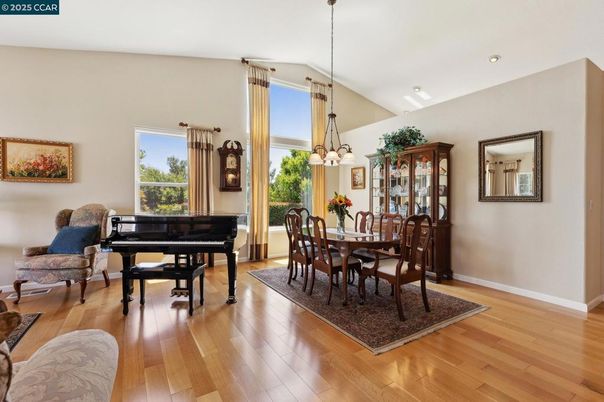 Chandelier, Dining room, Interior, Pendant Lights, Piano, Recessed Lighting, Wood Texture Flooring