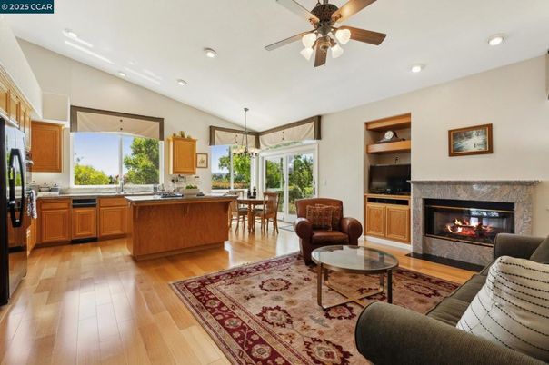 Chandelier, Dining room, Fireplace, Interior, Kitchen, Living room, Pendant Lights, Recessed Lighting, Wood Texture Flooring
