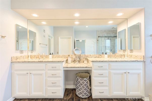 Bathroom, Dual Sink Vanities, Interior, Recessed Lighting, Wood Texture Flooring