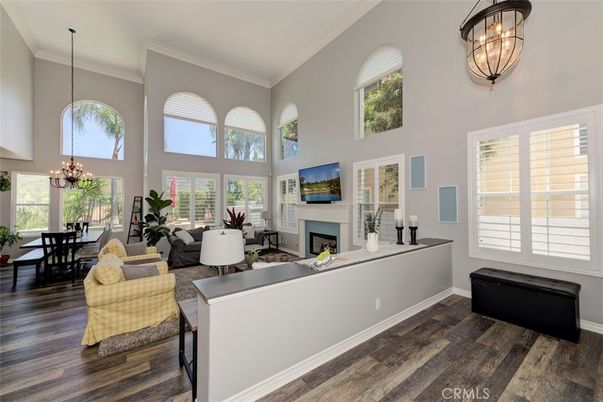 Chandelier, Dining room, Fireplace, Interior, Living room, Pendant Lights, Wood Texture Flooring