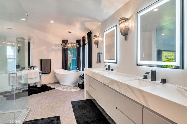 Bathroom, Chandelier, Dual Sink Vanities, Free Standing Baths, Glass Shower, Interior, Pendant Lights, Recessed Lighting