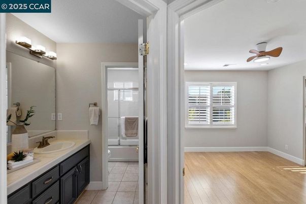 Bathroom, Glass Shower, Interior, Recessed Lighting, Wood Texture Flooring
