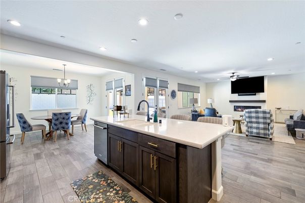 Dining room, Fireplace, Interior, Kitchen, Living room, Pendant Lights, Recessed Lighting, Wood Texture Flooring