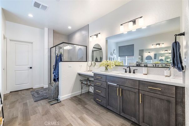 Bathroom, Dual Sink Vanities, Glass Shower, Interior, Recessed Lighting, Wood Texture Flooring