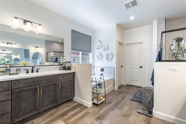 Bathroom, Dual Sink Vanities, Interior, Recessed Lighting, Wood Texture Flooring