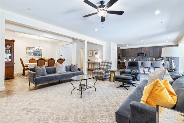 Chandelier, Dining room, Interior, Kitchen, Living room, Recessed Lighting, Stainless Steel Appliances, Wood Texture Flooring