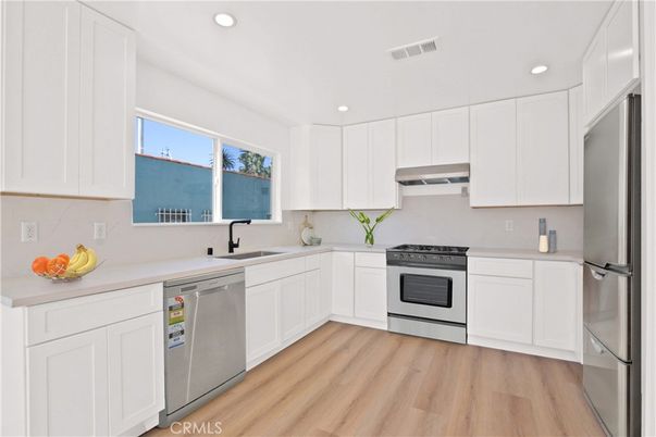 Interior, Kitchen, Recessed Lighting, Stainless Steel Appliances, Wood Texture Flooring