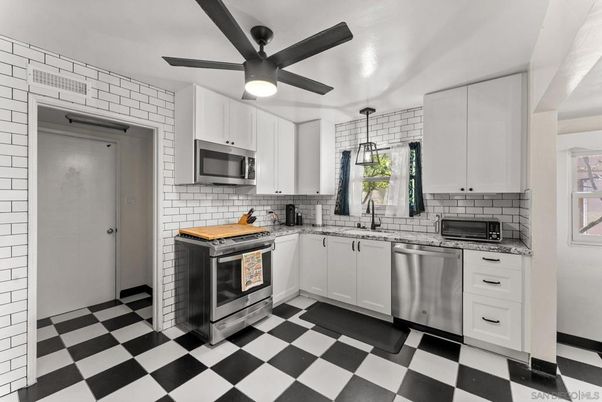 Interior, Kitchen, Pendant Lights, Stainless Steel Appliances, Stone Walls