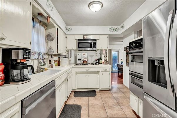 Interior, Kitchen, Stainless Steel Appliances, Tile Countertops