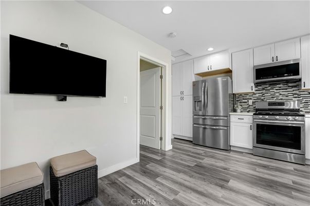Interior, Kitchen, Recessed Lighting, Stainless Steel Appliances, Wood Texture Flooring