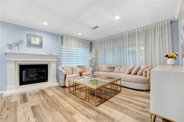 Fireplace, Interior, Living room, Recessed Lighting, Wood Texture Flooring