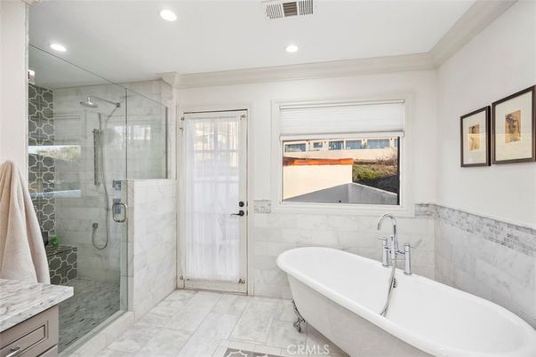Bathroom, Free Standing Baths, Glass Shower, Interior, Marble, Marble Walls, Recessed Lighting