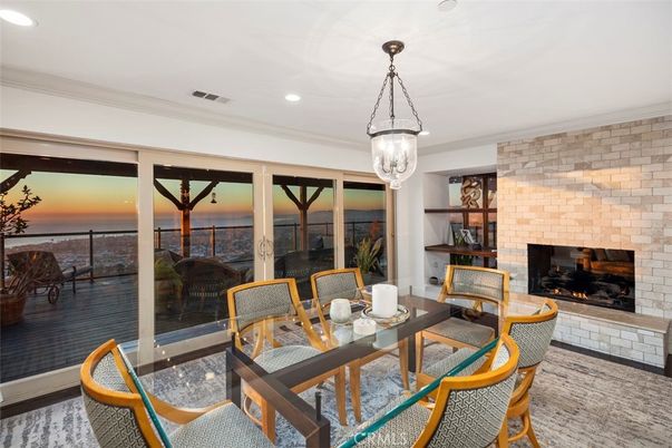 Dining room, Fireplace, Interior, Pendant Lights, Recessed Lighting, Stone Walls, Water