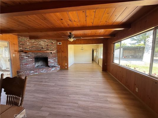 Empty room, Fireplace, Interior, Stone Walls, Wooden Beams, Wooden Ceilings, Wood Texture Flooring
