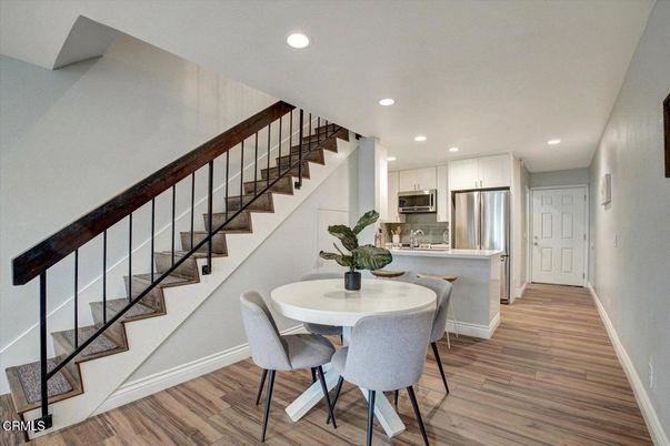Dining room, Interior, Kitchen, Recessed Lighting, Stainless Steel Appliances, Wood Texture Flooring