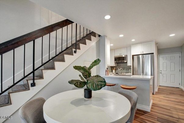 Dining room, Interior, Kitchen, Recessed Lighting, Stainless Steel Appliances, Wood Texture Flooring