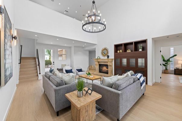 Chandelier, Fireplace, Interior, Living room, Recessed Lighting, Wood Texture Flooring