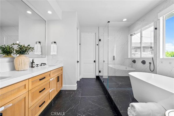 Bathroom, Dual Sink Vanities, Free Standing Baths, Glass Shower, Interior, Marble, Marble Walls, Recessed Lighting