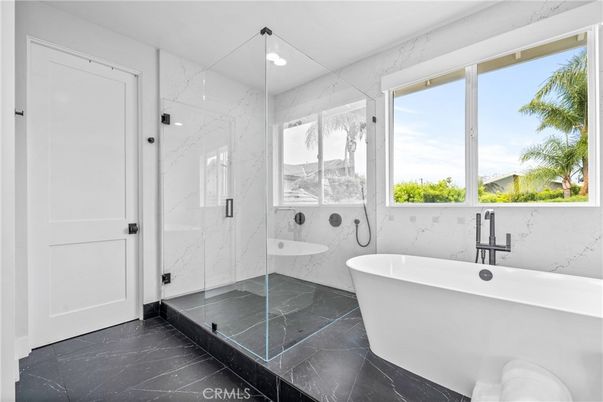 Bathroom, Free Standing Baths, Glass Shower, Interior, Marble, Marble Walls, Recessed Lighting