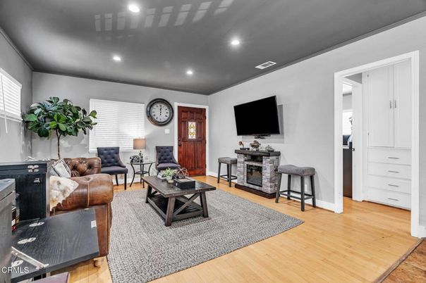 Fireplace, Interior, Living room, Recessed Lighting, Wood Texture Flooring