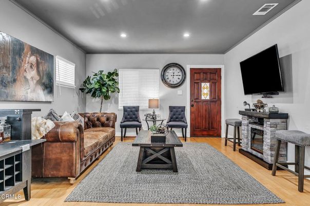 Fireplace, Interior, Living room, Recessed Lighting, Wood Texture Flooring