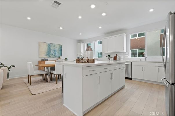 Dining room, Interior, Kitchen, Recessed Lighting, Stainless Steel Appliances, Wood Texture Flooring