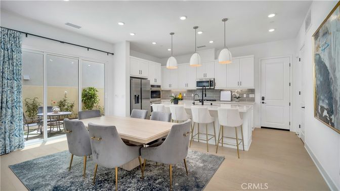 Dining room, Interior, Kitchen, Pendant Lights, Recessed Lighting, Stainless Steel Appliances, Wood Texture Flooring