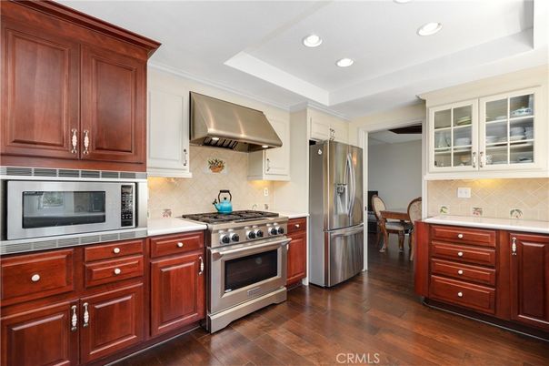 Dining room, Interior, Kitchen, Recessed Lighting, Stainless Steel Appliances, Wood Texture Flooring