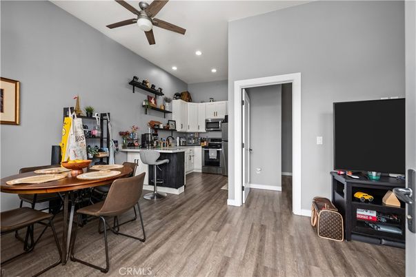 Dining room, Interior, Kitchen, Recessed Lighting, Stainless Steel Appliances, Wood Texture Flooring