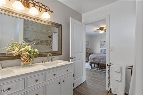 Bathroom, Bedroom, Dual Sink Vanities, Interior, Marble Walls, Wood Texture Flooring
