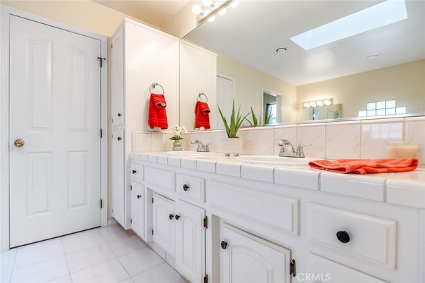 Bathroom, Dual Sink Vanities, Interior, Recessed Lighting, Tile Countertops
