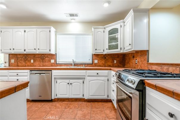 Interior, Kitchen, Recessed Lighting, Stainless Steel Appliances, Tile Countertops