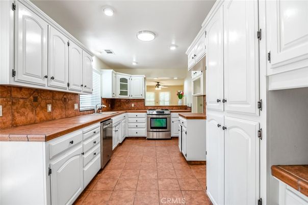 Interior, Kitchen, Recessed Lighting, Stainless Steel Appliances, Tile Countertops