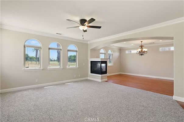 Chandelier, Empty room, Fireplace, Interior, Recessed Lighting, Wood Texture Flooring