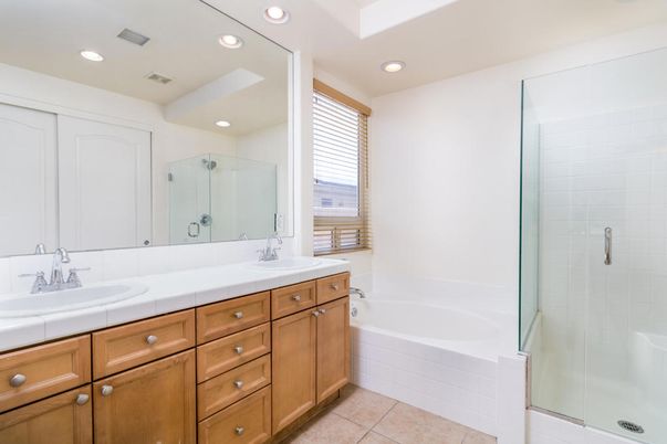 Bathroom, Dual Sink Vanities, Glass Shower, Interior, Recessed Lighting, Tile Countertops