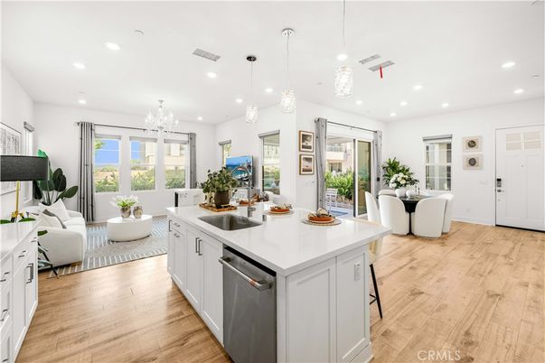 Chandelier, Dining room, Interior, Kitchen, Living room, Pendant Lights, Recessed Lighting, Wood Texture Flooring