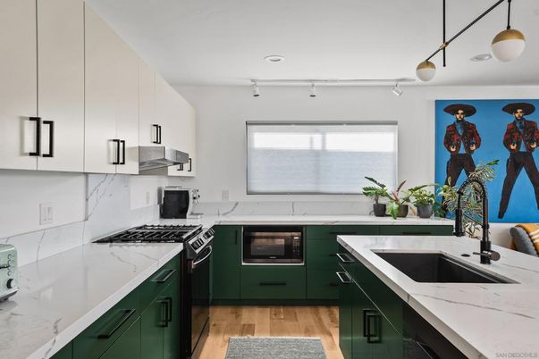 Interior, Kitchen, Marble Walls, Pendant Lights, Recessed Lighting, Stainless Steel Appliances, Wood Texture Flooring