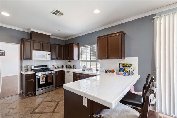 Interior, Kitchen, Recessed Lighting, Stainless Steel Appliances, Tile Countertops