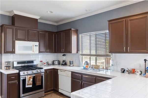 Interior, Kitchen, Recessed Lighting, Stainless Steel Appliances, Tile Countertops