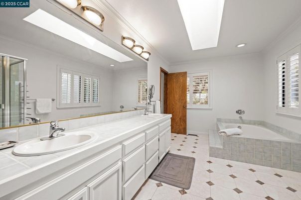 Bathroom, Dual Sink Vanities, Glass Shower, Interior, Recessed Lighting, Tile Countertops
